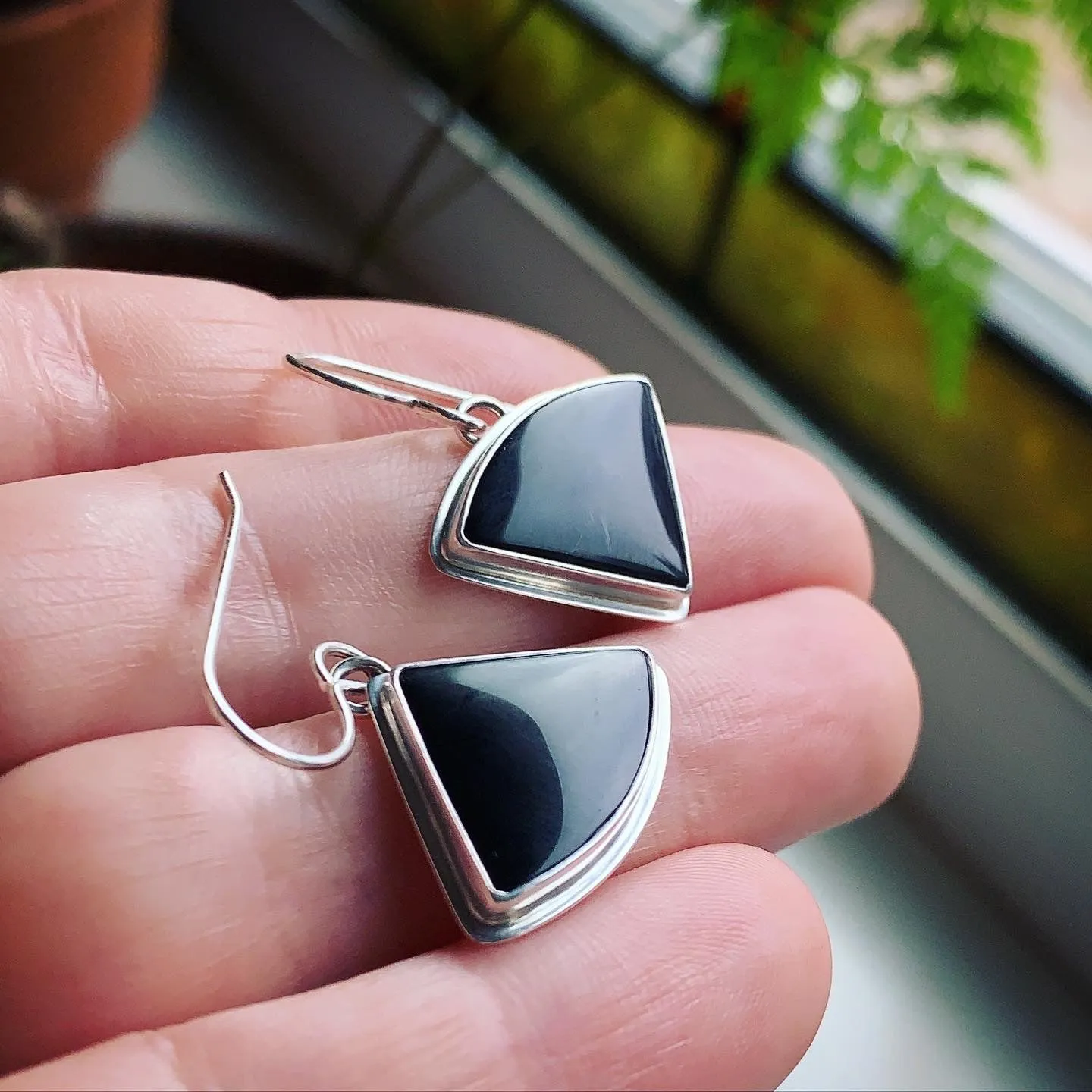 Black Onyx and Sterling Silver “happy accident” earrings.