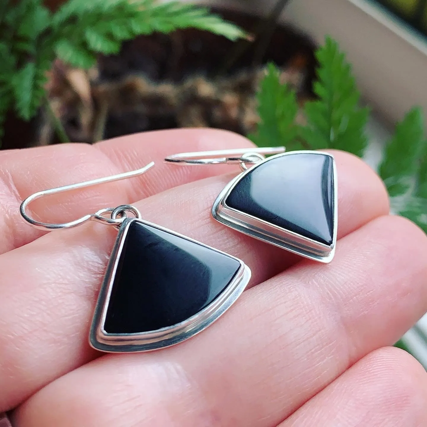 Black Onyx and Sterling Silver “happy accident” earrings.