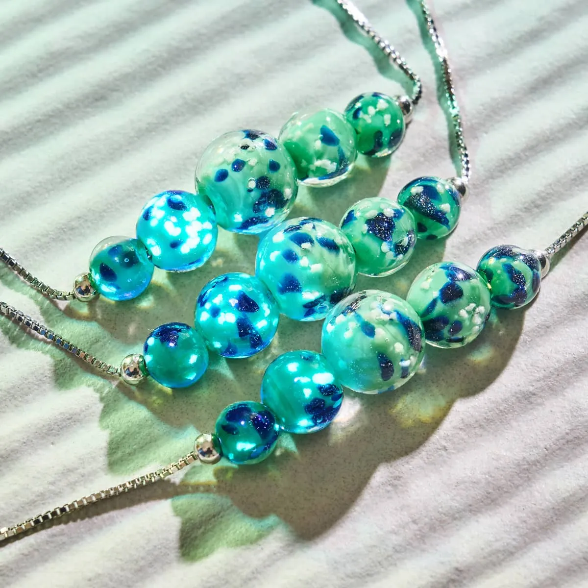 Blue Mint | .925 Sterling Silver | Firefly Glass Infinity Clasp Necklace