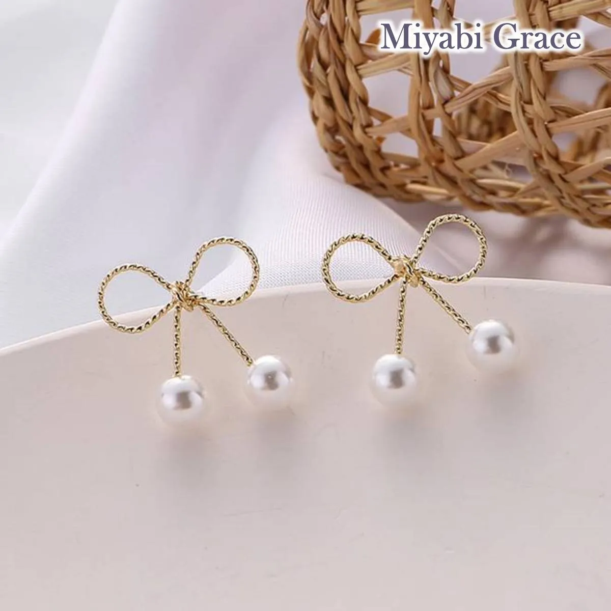 Gold Ribbon White Pearl Tie Invisible Clip On Stud Earrings