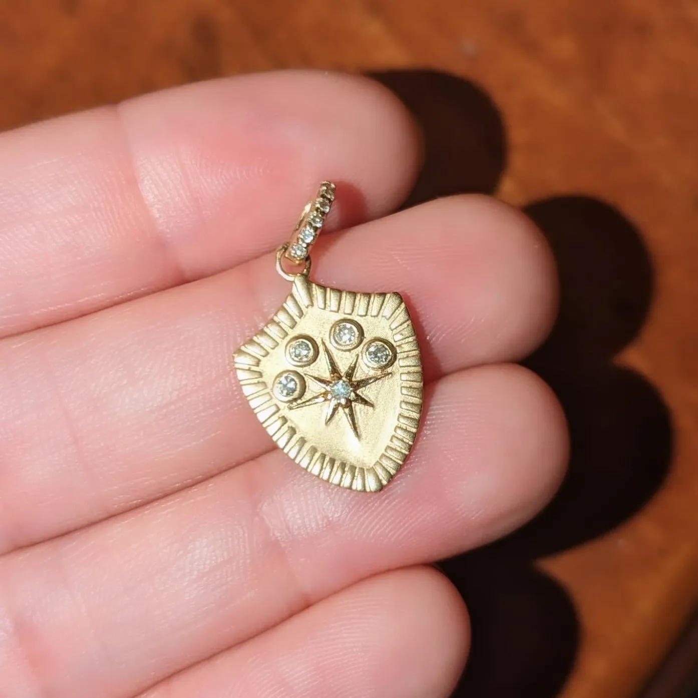 Gold Shield Pendant with North Star and Diamonds