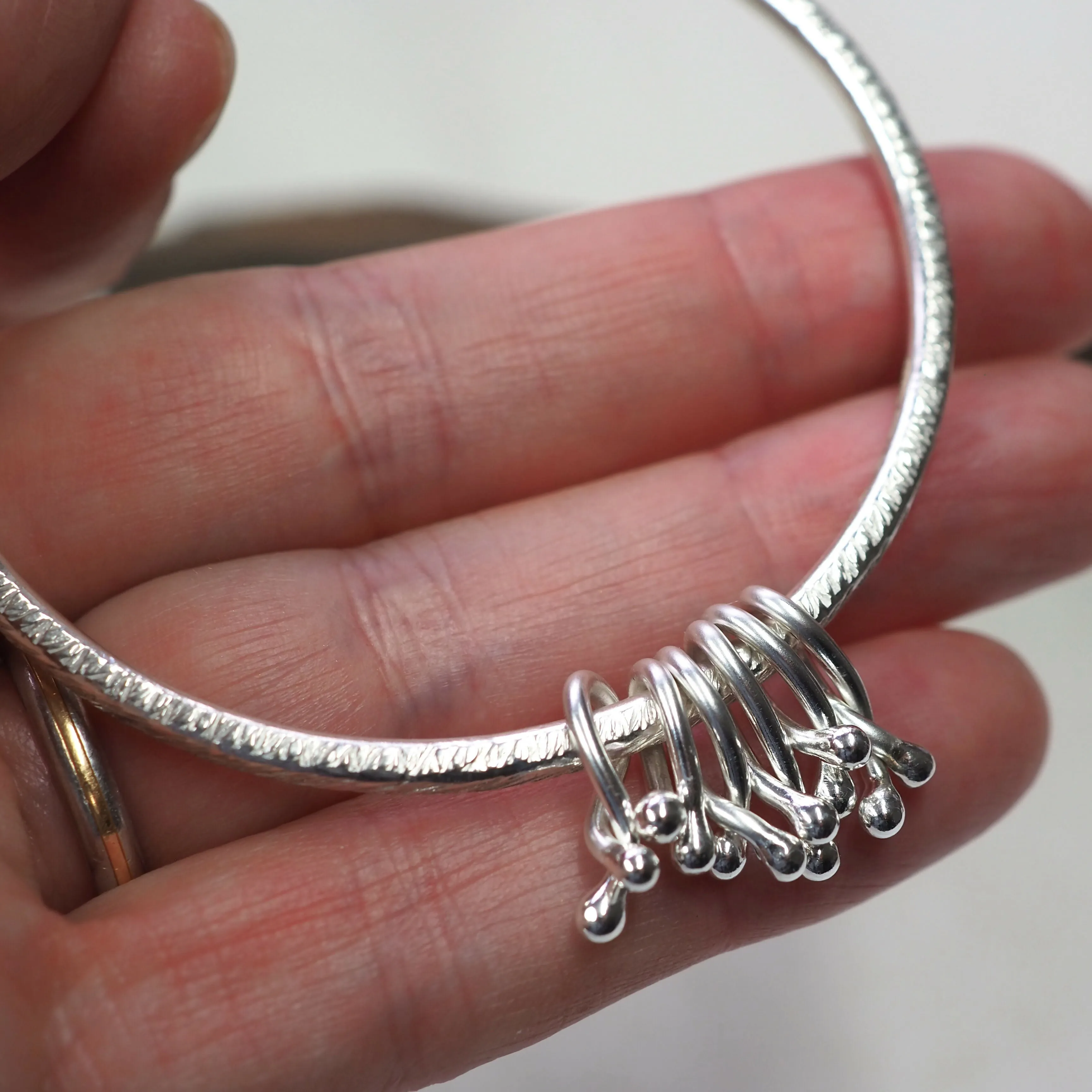 Hallmarked Silver 'Hug' Bangle