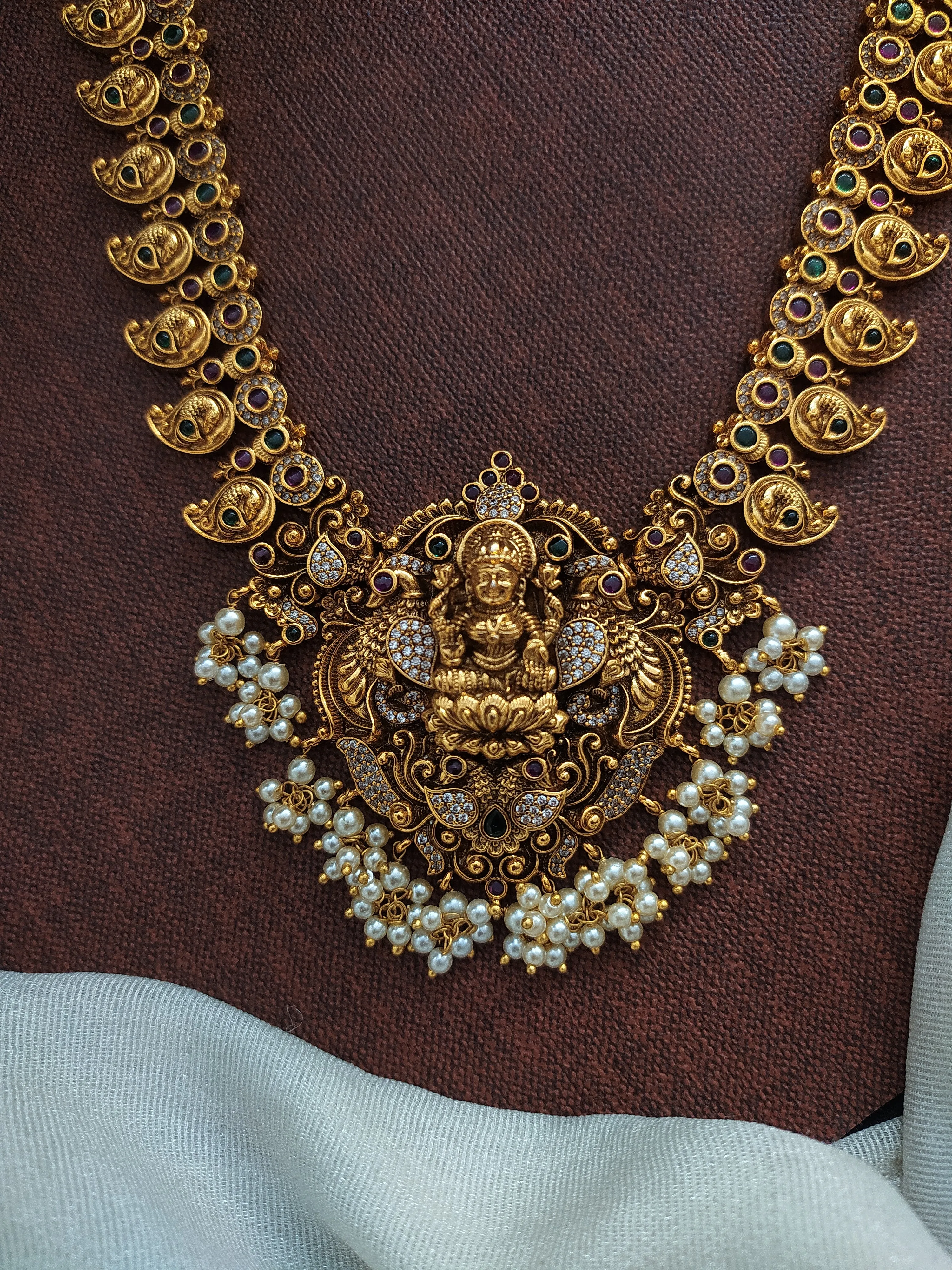 Peacock design kemp stones antique nagas long haram set with pearl drops